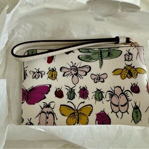 Prints Coach wristlet New